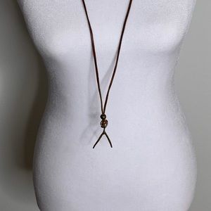 ANTHROPOLOGIE Wishbone leather long brass pendant necklace